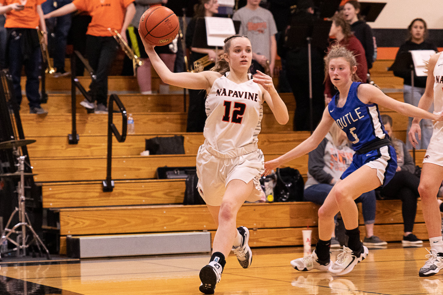 Napavine guard Avery Schutz throws a pass from the baseline against Toutle Lake Jan. 24.
