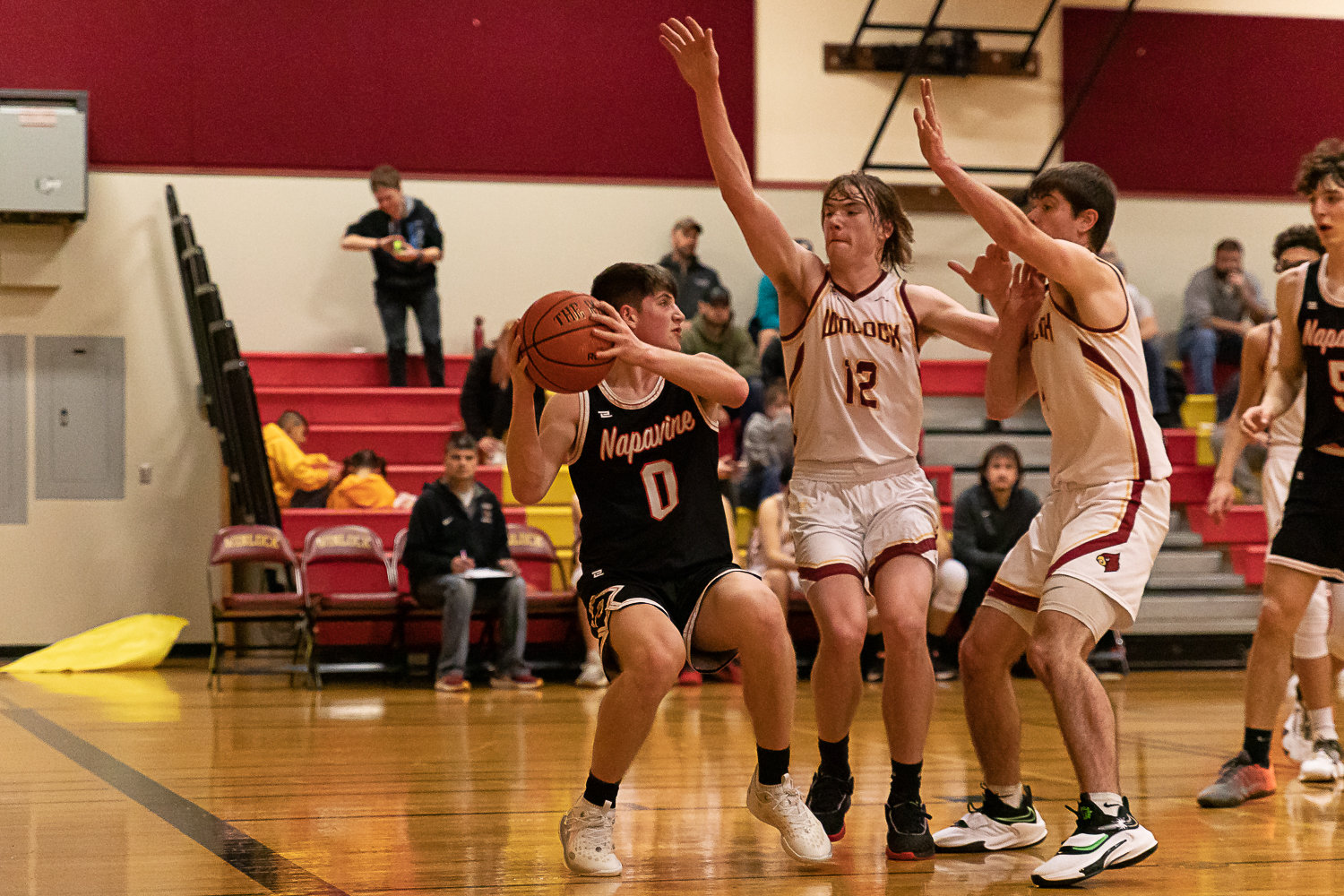 Napavine guard Cayle Kelly looks to pass from underneath the basket against Winlock Jan. 24.