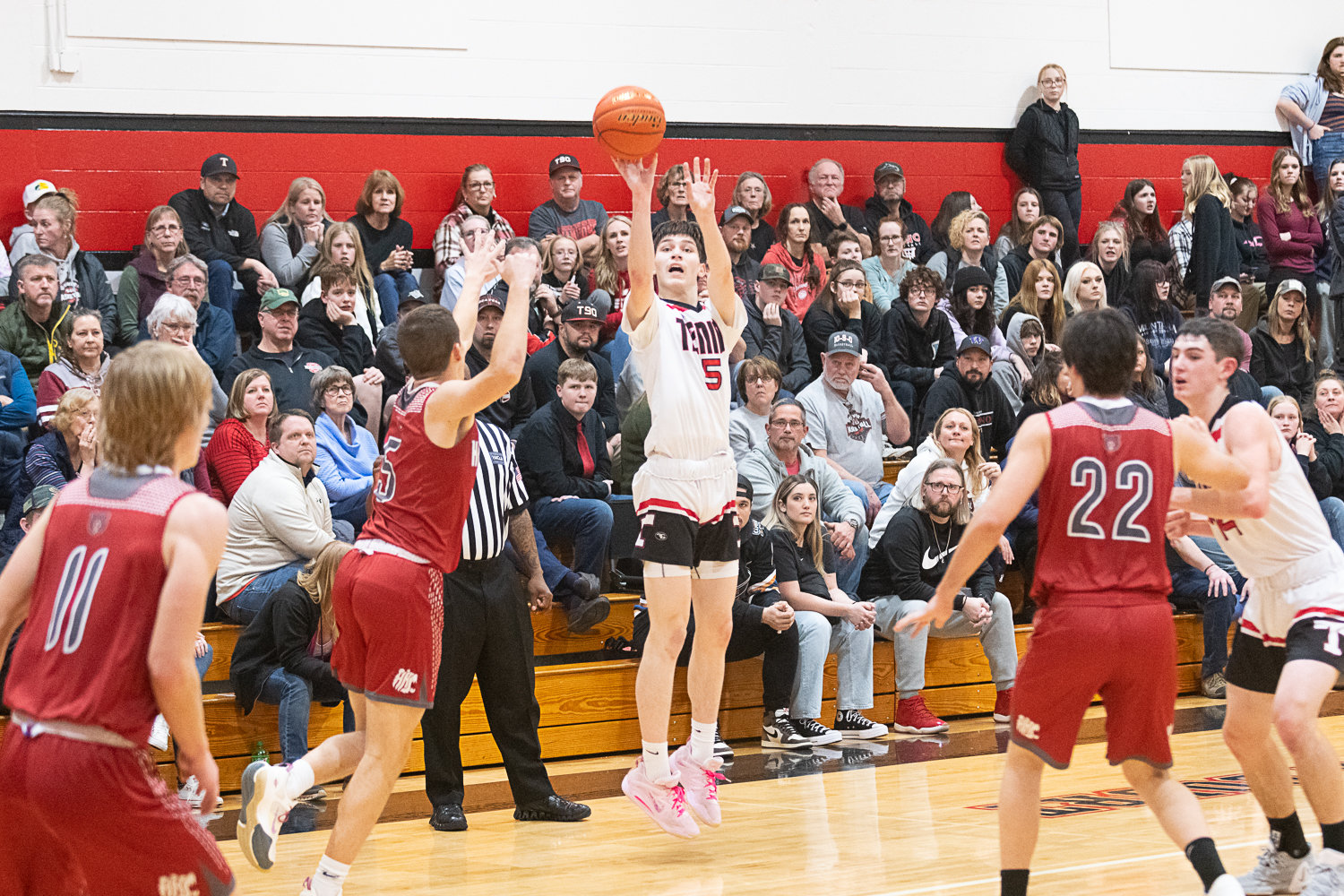 Noah Schow takes a 3-pointer during the first half of Tenino's 47-33 loss to Hoquiam on Jan. 24.