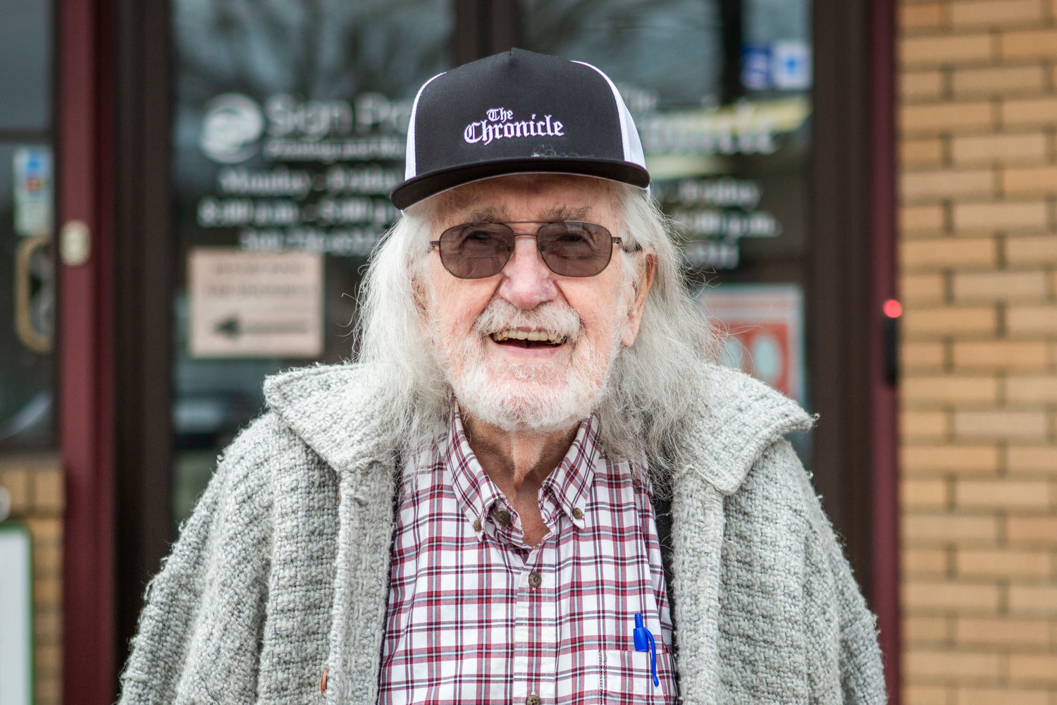 Bill Moeller smiles for a portrait outside The Chronicle in Centralia on Jan. 24, 2023.