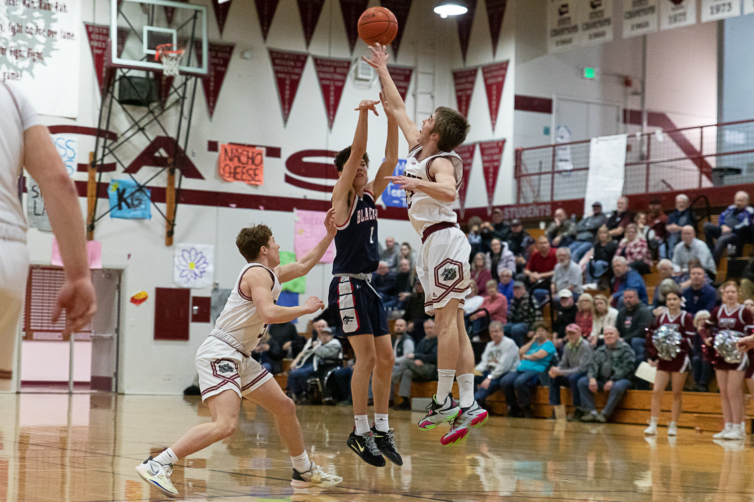 Black Hills guard Simon Nysted is blocked by W.F. West guard Lucas Hoff Jan. 25.