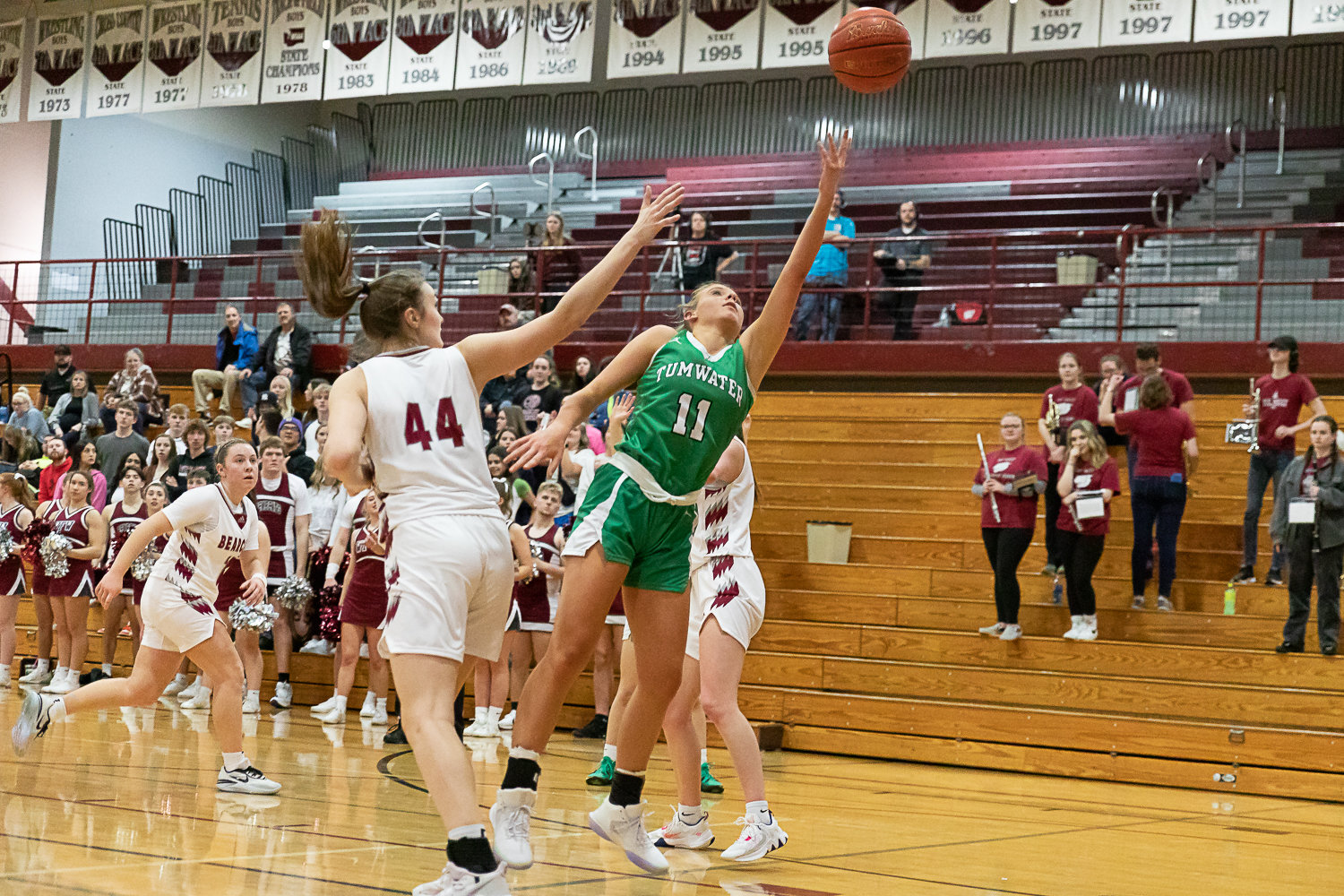 Tumwater guard Kylie Waltermeyer makes a scoop shot against W.F. West Jan. 26.