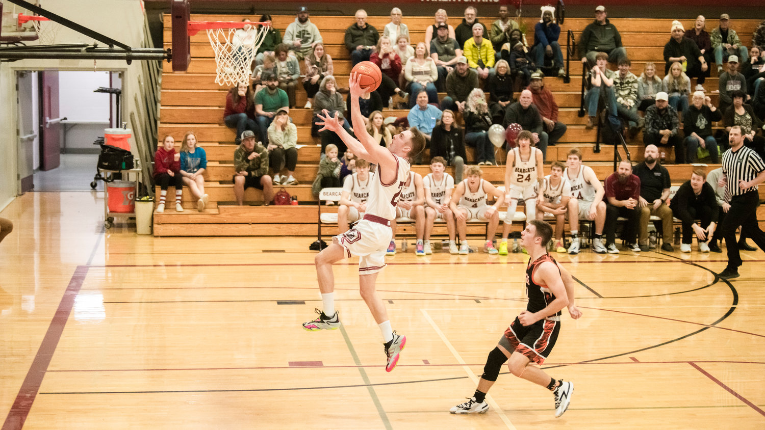W.F. West junior Lucas Hoff (22) goes in for a layup on a fastbreak during a Tuesday night game in Chehalis.