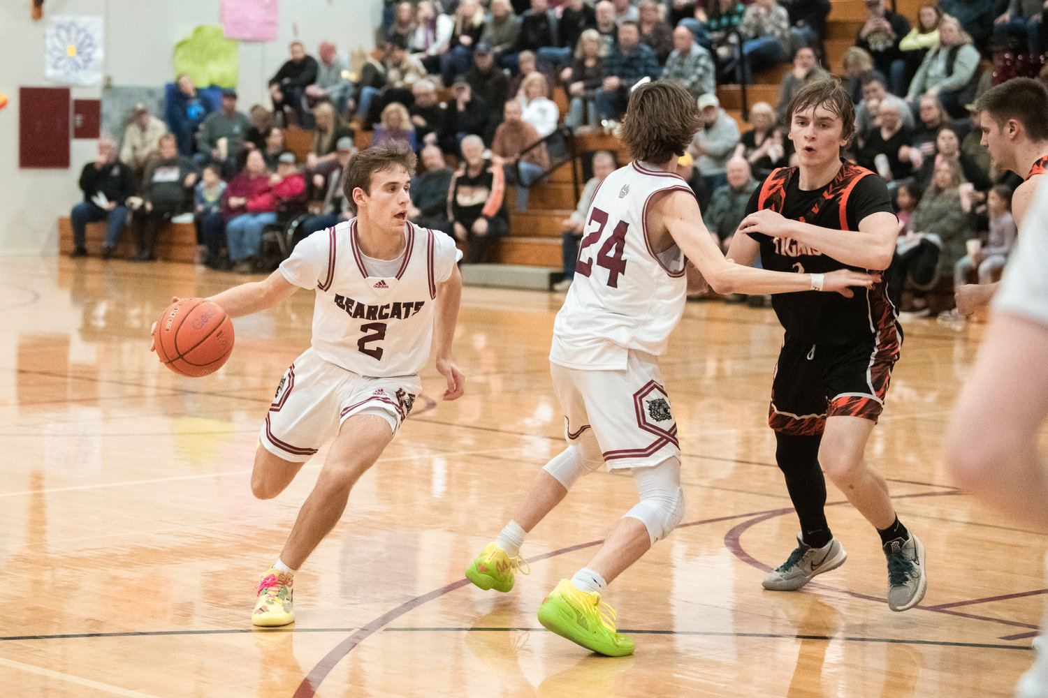 W.F. West junior Braden Jones (2) dribbles toward the basket during a Tuesday night game in Chehalis.