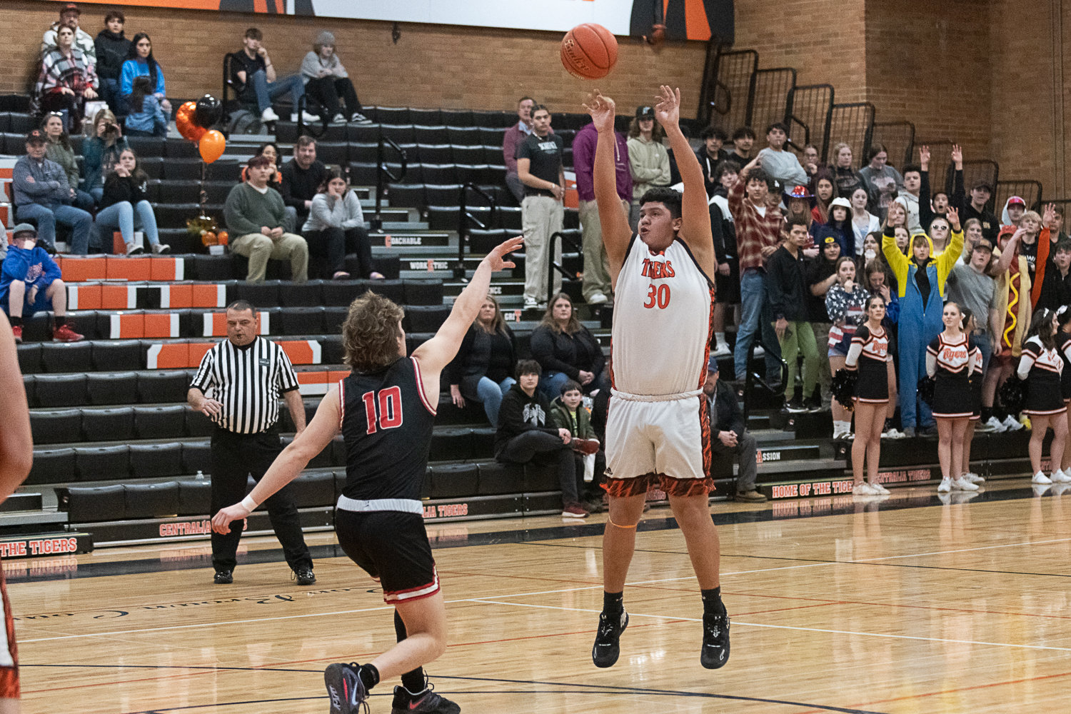 Carlos Vallejo launches a 3-pointer during the first quarter of Centralia's loss to Shelton on Feb. 2.