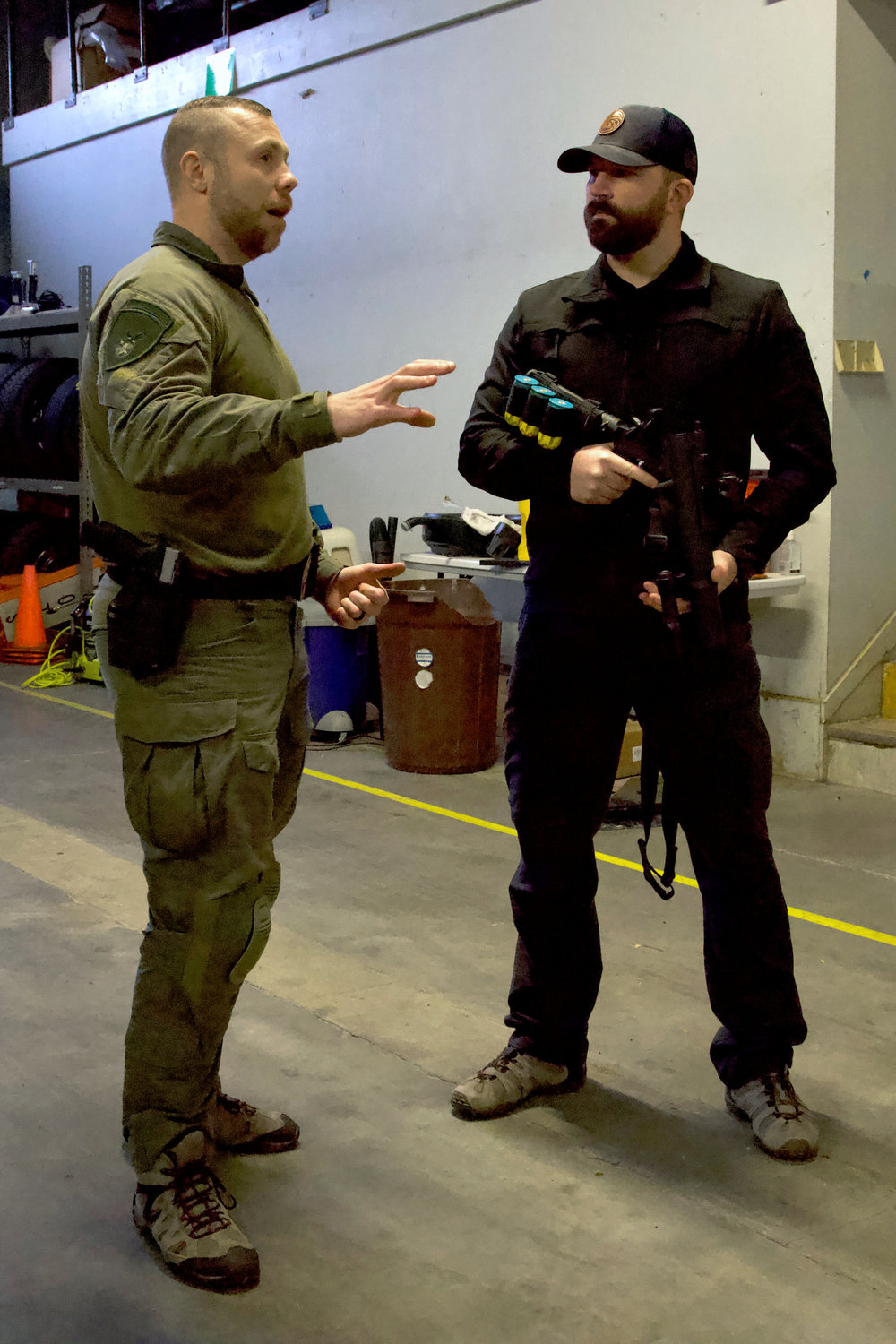 Centralia Police Detective Timothy O’Dell trains a newly-hired lateral officer on use of a 40 mm less-lethal round launcher at the Centralia Police Department’s Mellen Street training facility on Thursday. The rounds are considered a safer, more-versatile alternative to bean bag rounds.