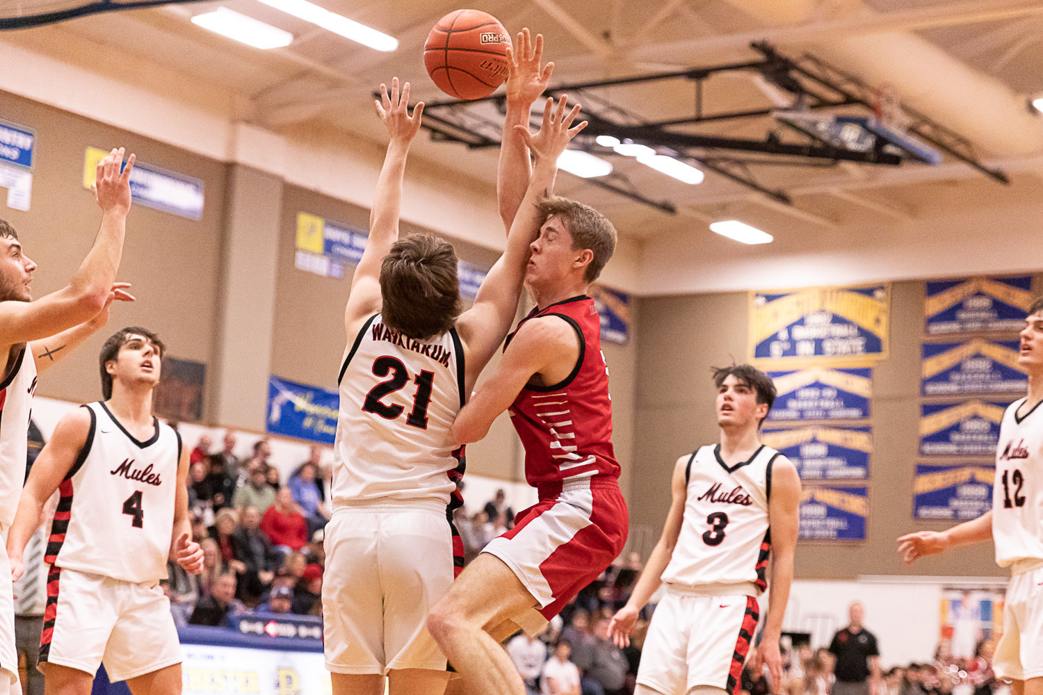 Toledo forward Conner Olmstead is fouled against Wahkiakum in the first round of the 2B District 4 tournament Feb. 4 at Rochester.