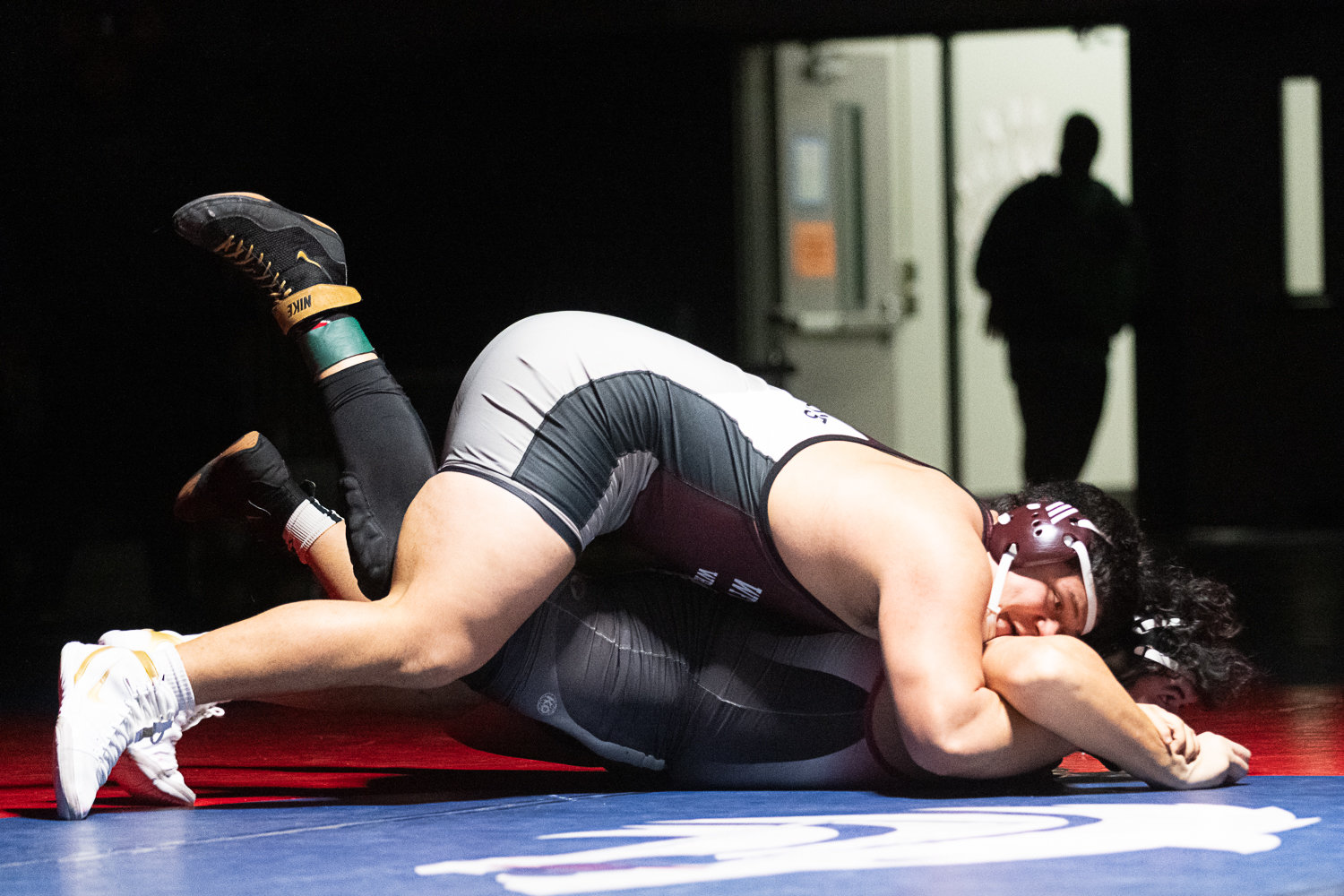 W.F. West's Daniel Matagi gets on top of his opponent during the 285-pound finals at the 2A Evergreen Sub-Regional Tournament at Black Hills on Feb. 4.