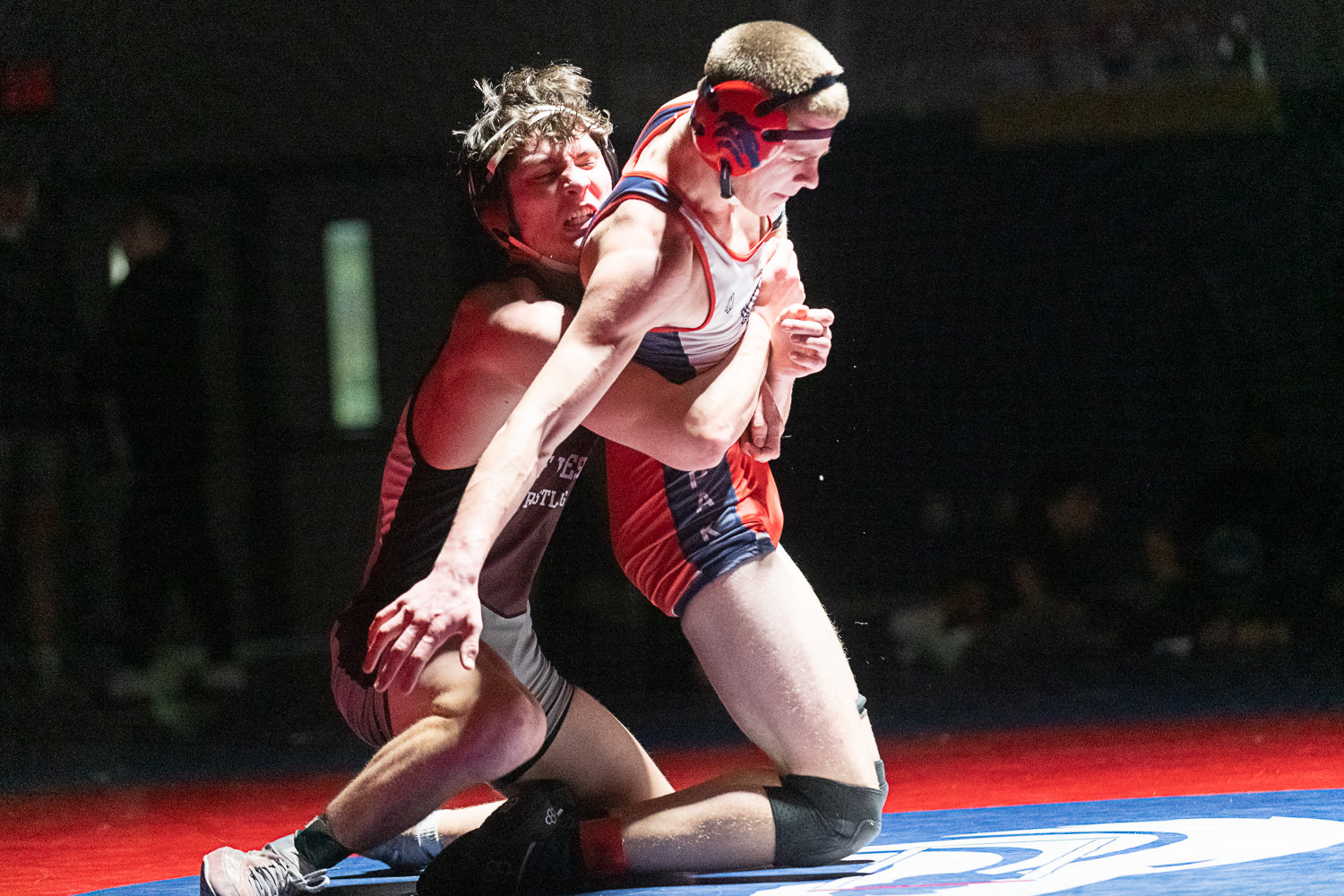 W.F. West's Andrew Snyder and Black Hills' Ammon Combs compete for the 152-pound title at the 2A Evergreen Sub-Regional Tournament at Black Hills on Feb. 4.