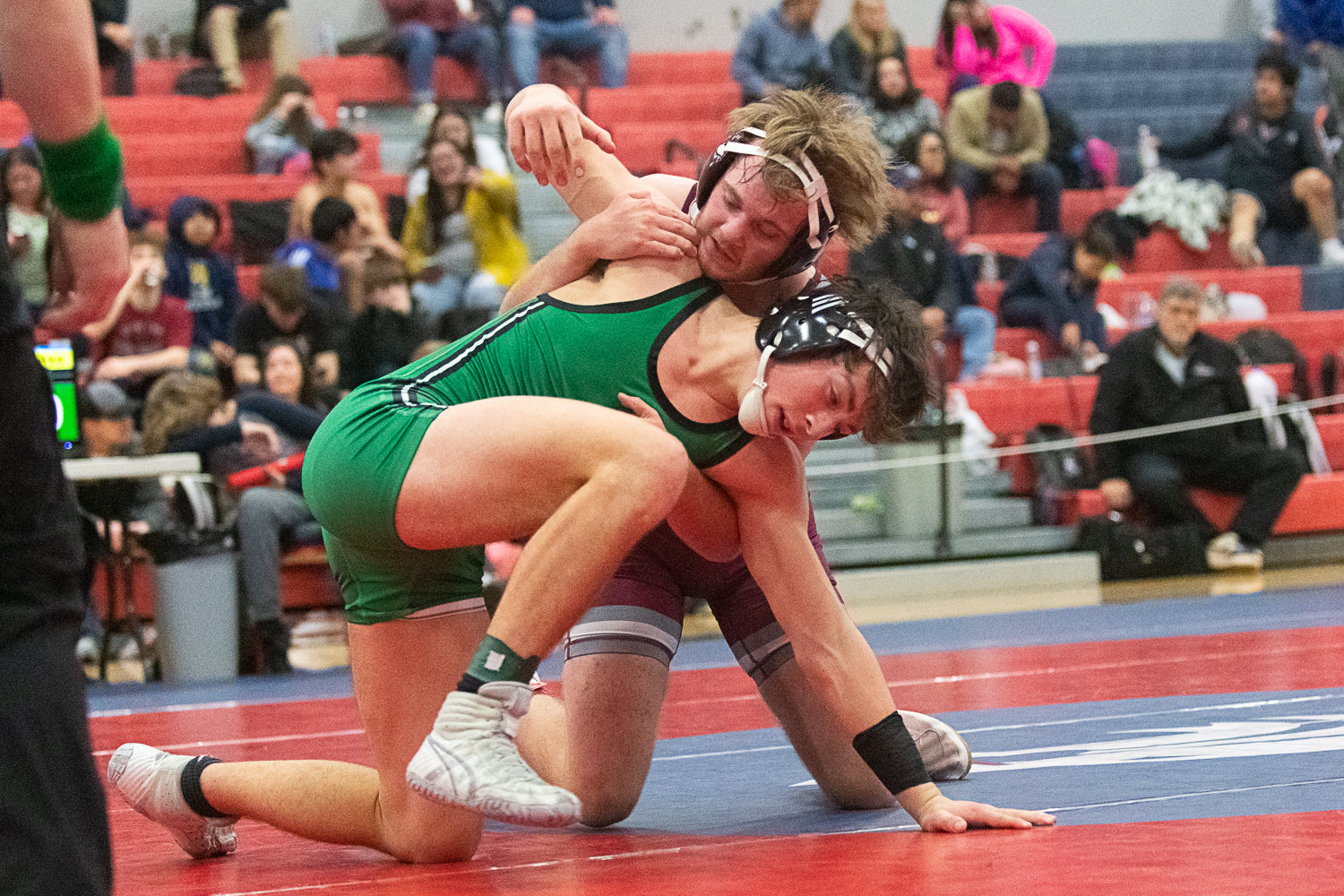 W.F. West's Kyle Nowels takes on Tumwater's Cash Short in the third-place match at 170 at the 2A Evergreen Sub-Regional Tournament at Black Hills on Feb. 4.