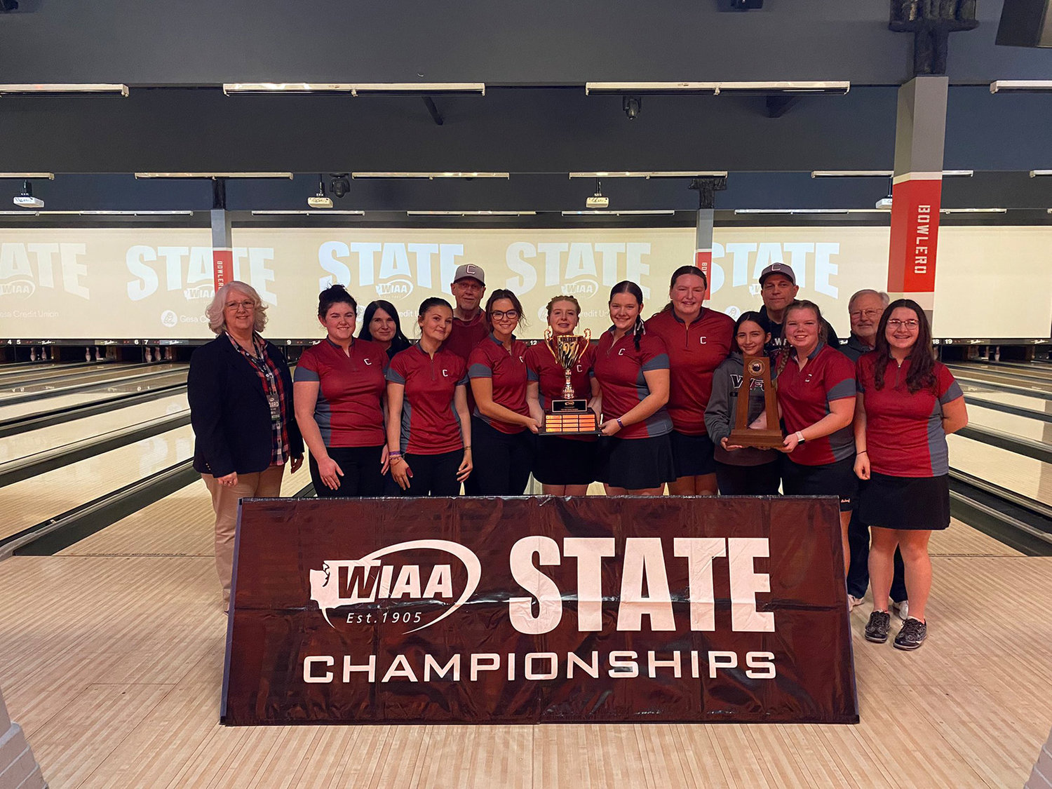 The W.F. West Bearcats pose for a team photo after winning the 1A/2A girls bowling state championship on Saturday afternoon in Tukwila.