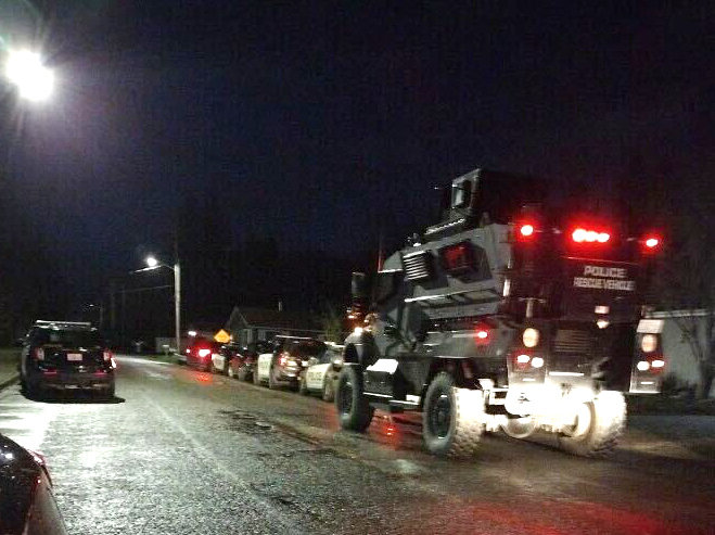 A Thurston County SWAT vehicle arrives in the 1100 block of Eckerson Road at about 6:30 p.m. on Sunday. 