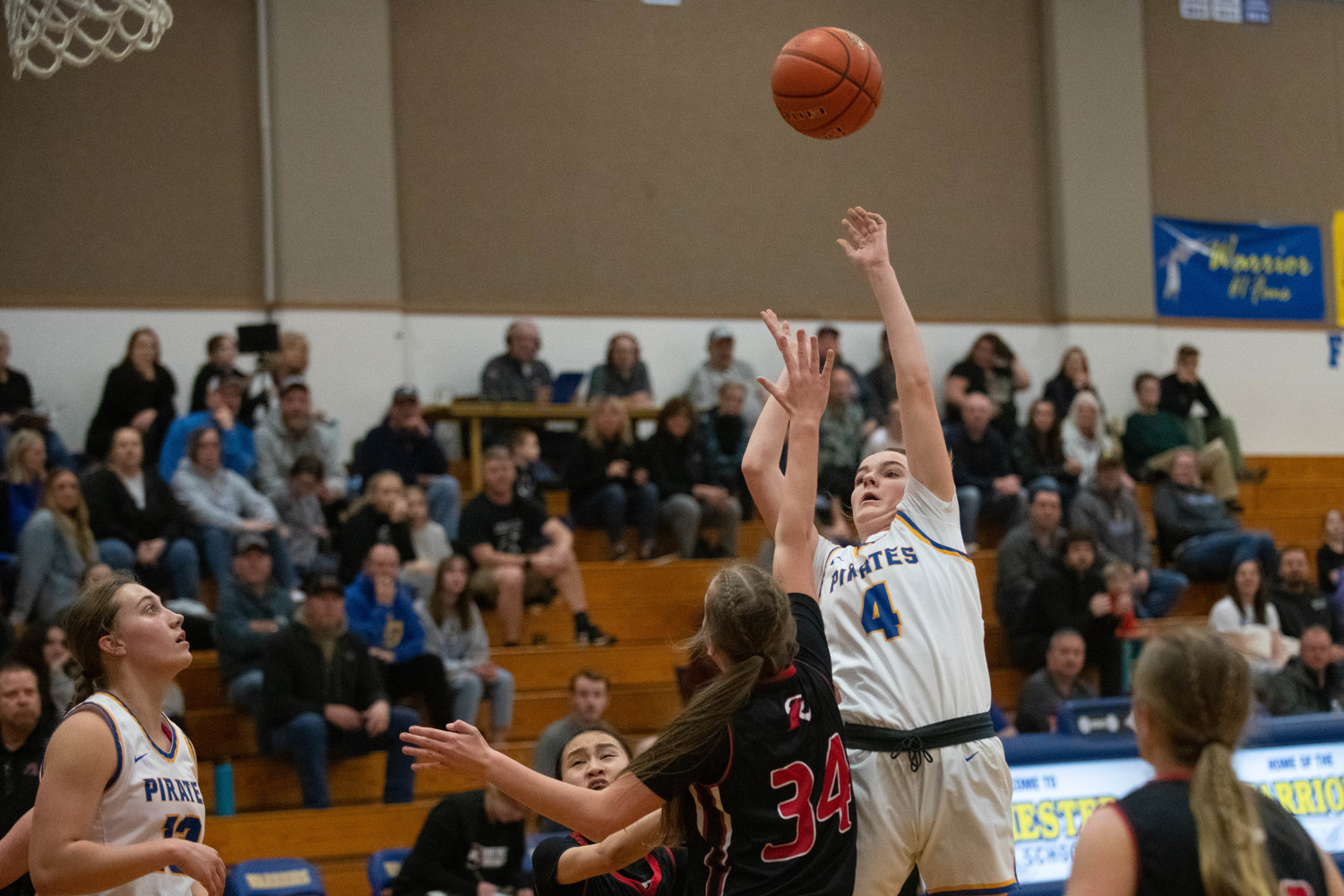 Brooklyn Loose puts up an awkward shot during the first half of Adna's district quarterfinal game against Raymond at Rochester on Feb. 7.