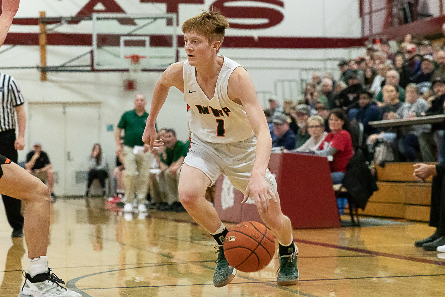 Morton-White Pass guard Jake Cournyer drives baseline against Rainier in the 2B District 4 quarterfinals at W.F. West Feb. 8.