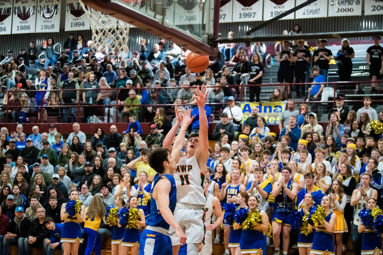 Morton-White Pass senior Hunter Hazen (11) shoots and scores in a 2B District Championship game against Adna Saturday night at W.F. West High School.