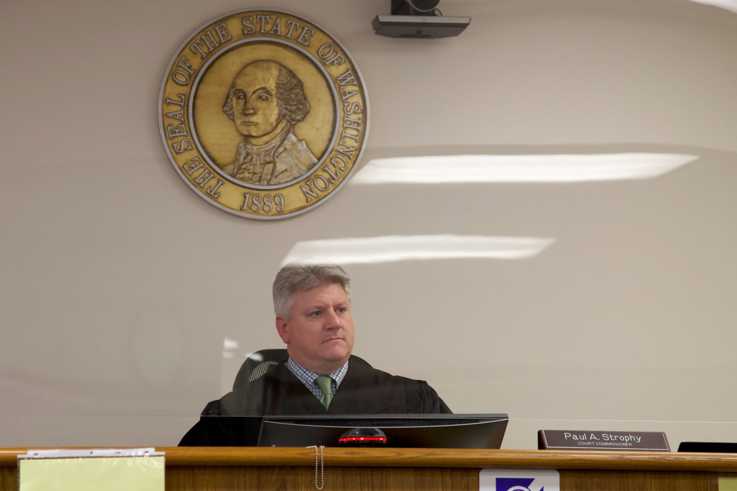 Lewis County Superior Court Commissioner Paul A. Strophy presides over preliminary hearings in Chehalis on Tuesday.