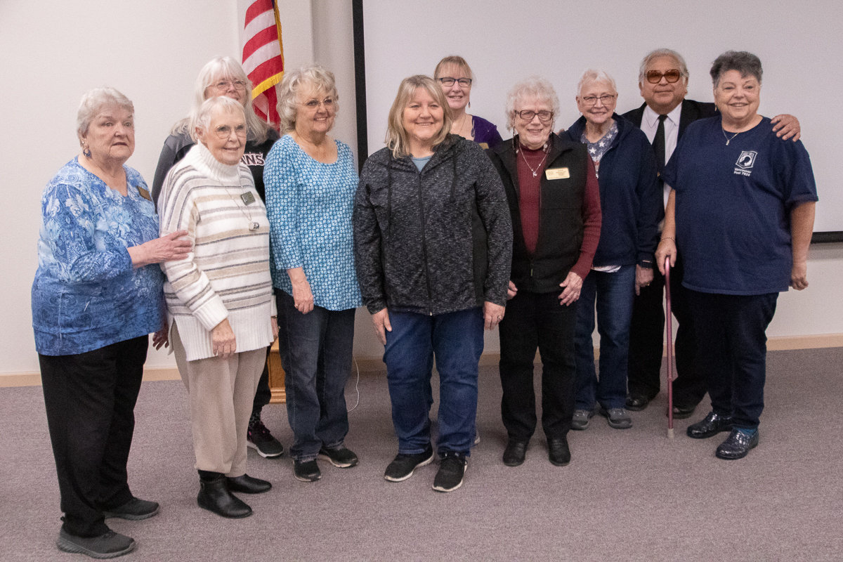 Members of the Veterans Memorial Museum Quilts of Valor chapter pose after a presentation ceremony at the museum on Thursday afternoon.