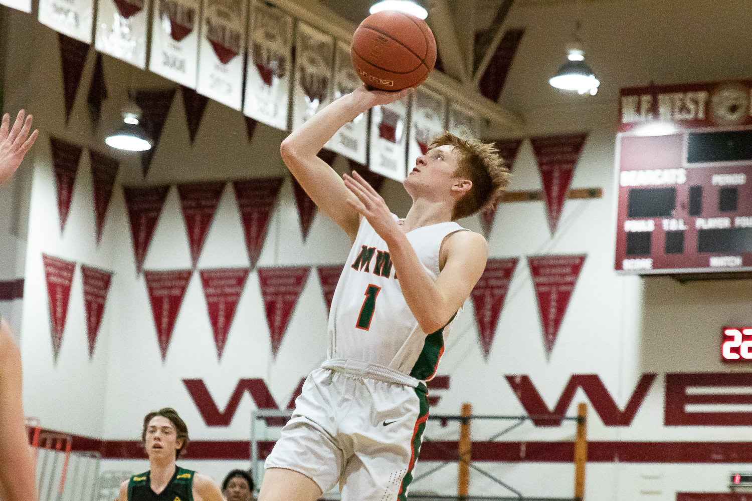 Morton-White Pass guard Jake Cournyer rises for a floater in an opening round of state matchup against Northwest Christian (Colbert) at W.F. West Feb. 25.