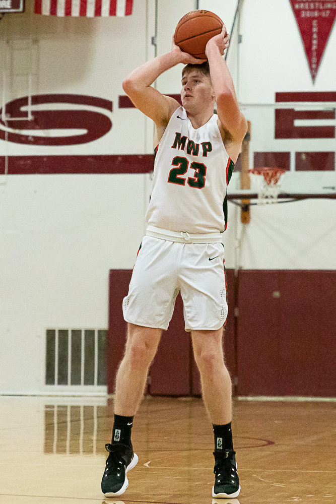 Morton-White Pass forward Jace Peters takes a 3-pointer in an opening round of state matchup against Northwest Christian (Colbert) at W.F. West Feb. 25.