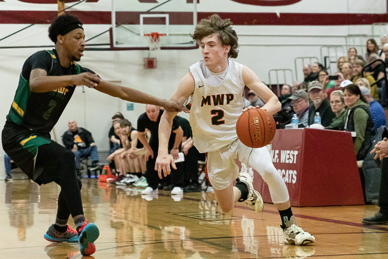 Morton-White Pass guard Judah Kelly drives baseline in an opening round of state matchup against Northwest Christian (Colbert) at W.F. West Feb. 25.