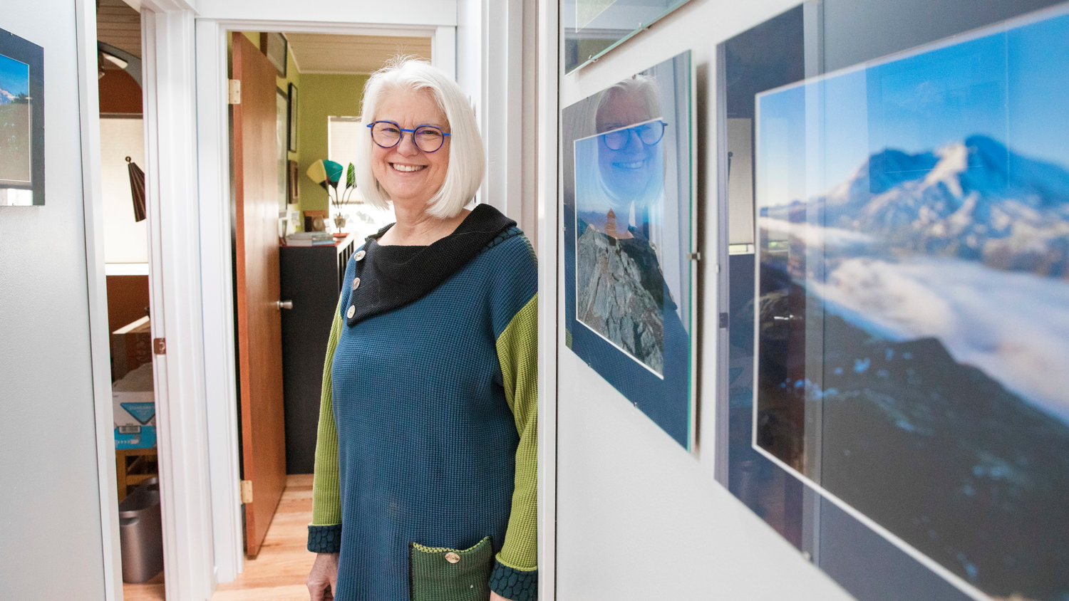 Gretchen Staebler smiles while talking about photos she’s taken on hikes that hang on display at her residence off Seminary Hill Road in Centralia.