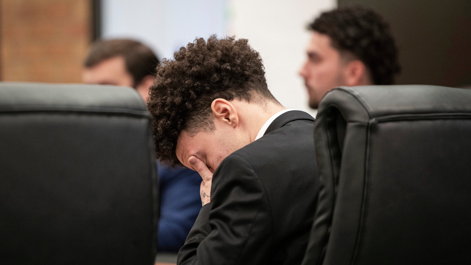Lathan Echols, known professionally as “Lil Mosey,” reacts after a jury reached a not-guilty verdict in Chehalis on Thursday.