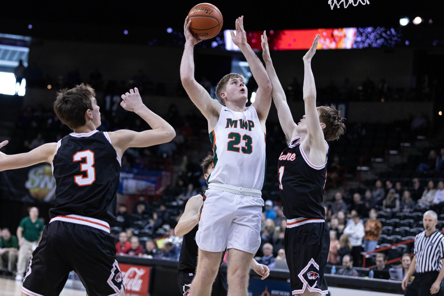 Morton-White Pass forward Jace Peters rises for a finish against Napavine in a loser-out 2B state consolation game at Spokane Arena March 3.