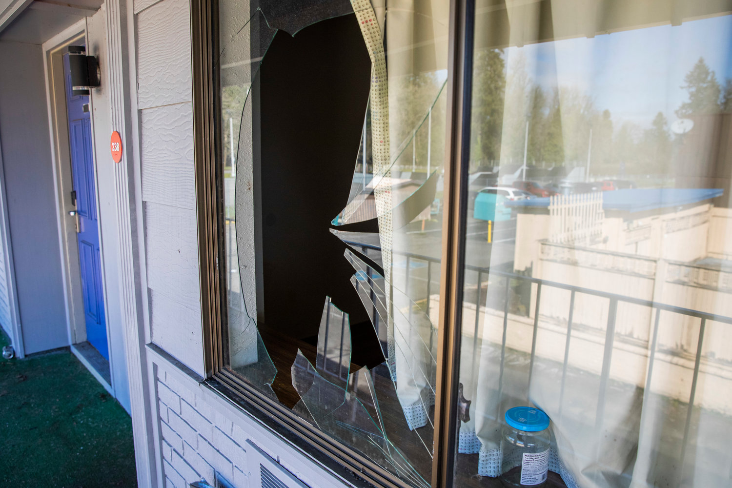 Shattered glass is seen on the second floor of the OYO Hotel in Centralia on Thursday.