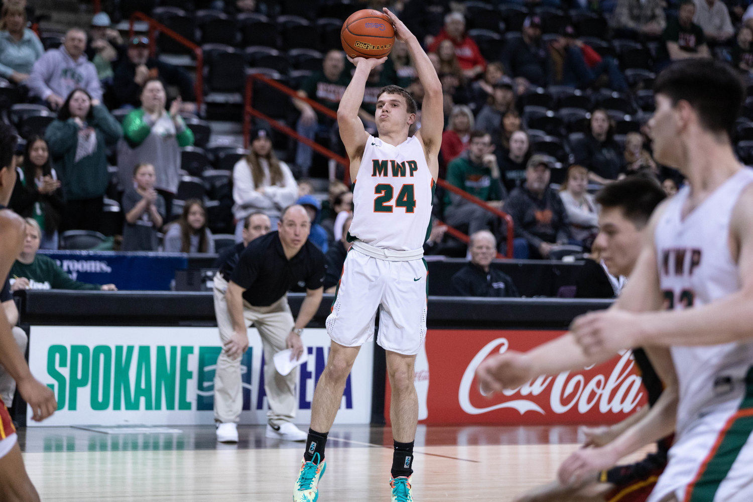Morton-White Pass guard Carter Dantinne takes a 3-pointer against Lake Roosevelt in the 2B state fourth-place game at Spokane Arena March 3.