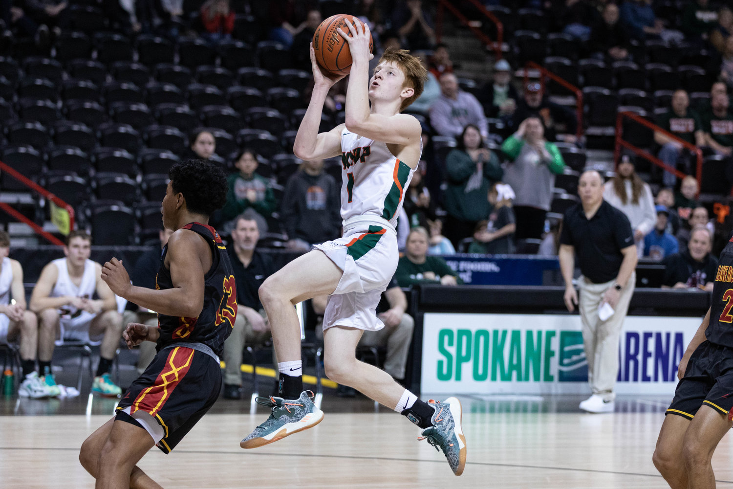 Morton-White Pass guard Jake Cournyer rises for a layup against Lake Roosevelt in the 2B state fourth-place game at Spokane Arena March 3.