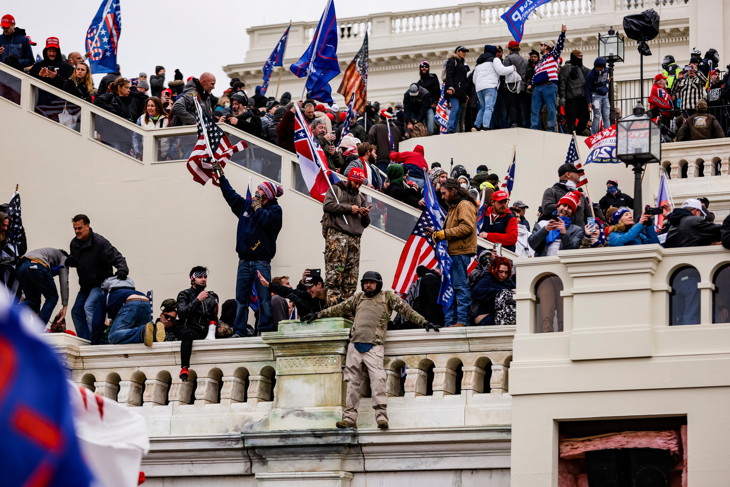 Pro-Trump supporters storm the U.S. Capitol following a rally with President Donald Trump on Jan. 6, 2021, in Washington, D.C. Federal officials expect that the number of rioters prosecuted could roughly double, with this month marking the 1,000th arrest, according to statistics from the U.S. attorney’s office. (Samuel Corum/Getty Images/TNS)