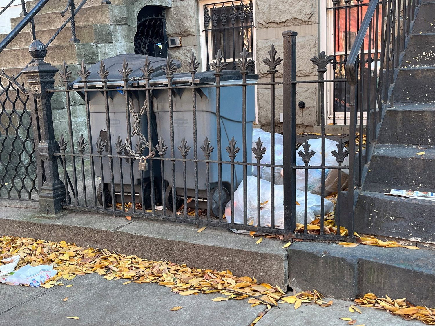 Garbage bags in front of New York City Mayor Eric Adams' house in Bedford-Stuyvesant, Brooklyn, on Friday, Dec. 2, 2022. (Ellen Moynihan/New York Daily News/TNS)