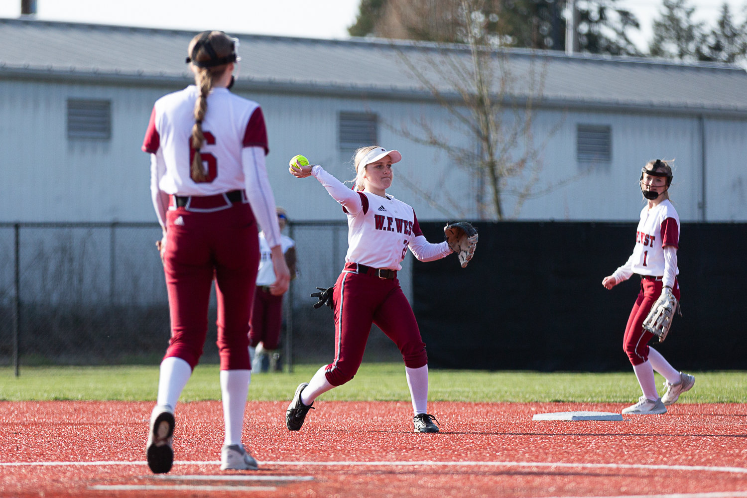 W.F. West shortstop Avalon Myers throws towards first against Timberline March 16 at Rec Park.