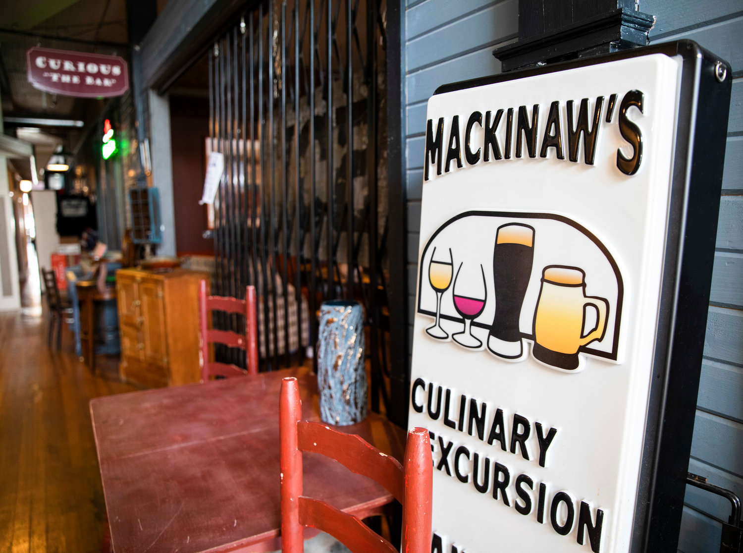 Signage for Mackinaw’s features a lineup of drinks in Chehalis.