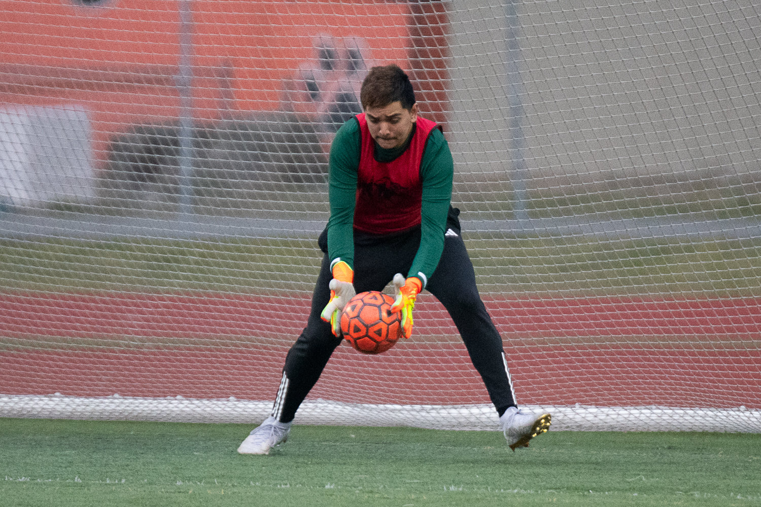 Centralia keeper Carlos Hernandez makes a save during the first half of the Tigers' match against Rochester on March 17.