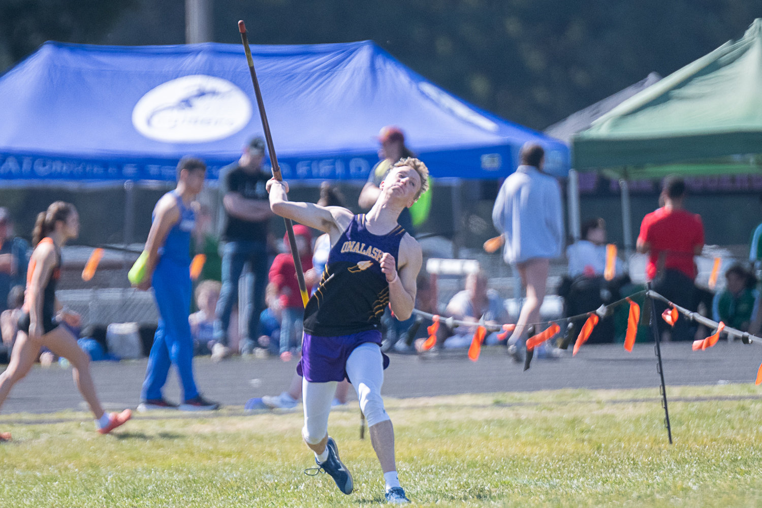 Ben Russon throws the javelin for Onalaska at the Rainier Icebreaker on March 18.