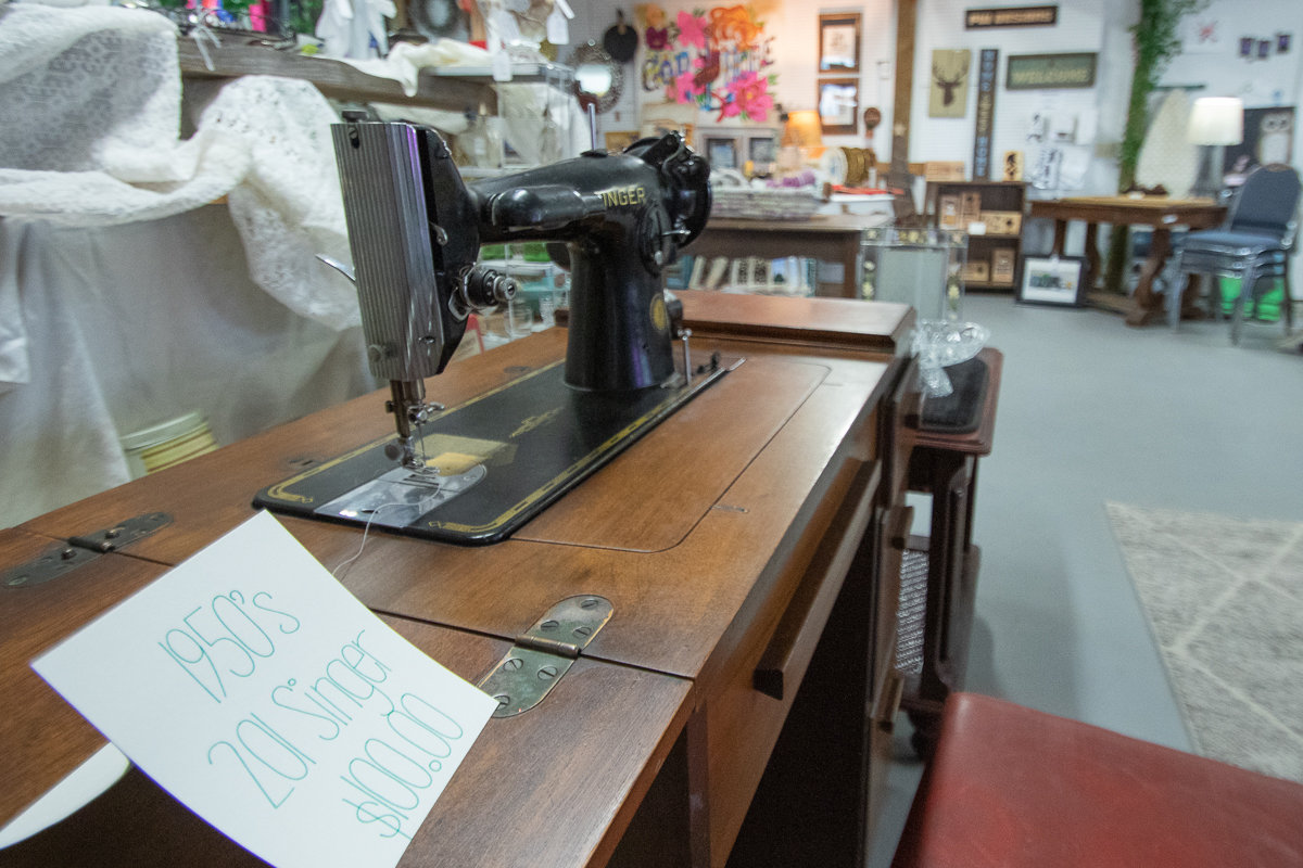 An antique Singer sewing machine sits for sale at Toledo Treasures which recently opened in November.