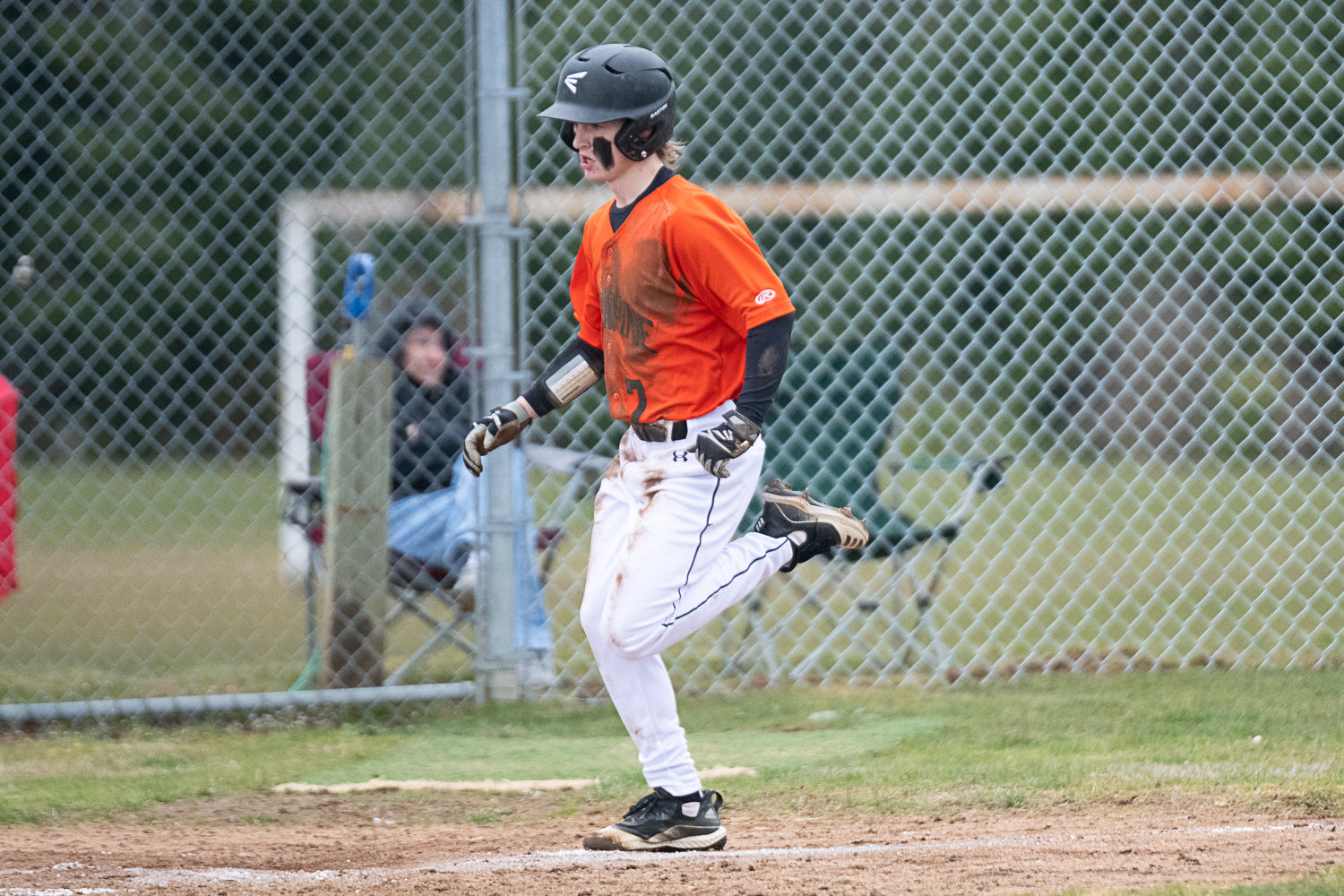 Lane Mitchell comes in to score Napavine's first run in the Tigers' 4-1 loss in the first game of their doubleheader against Toledo on March 20.