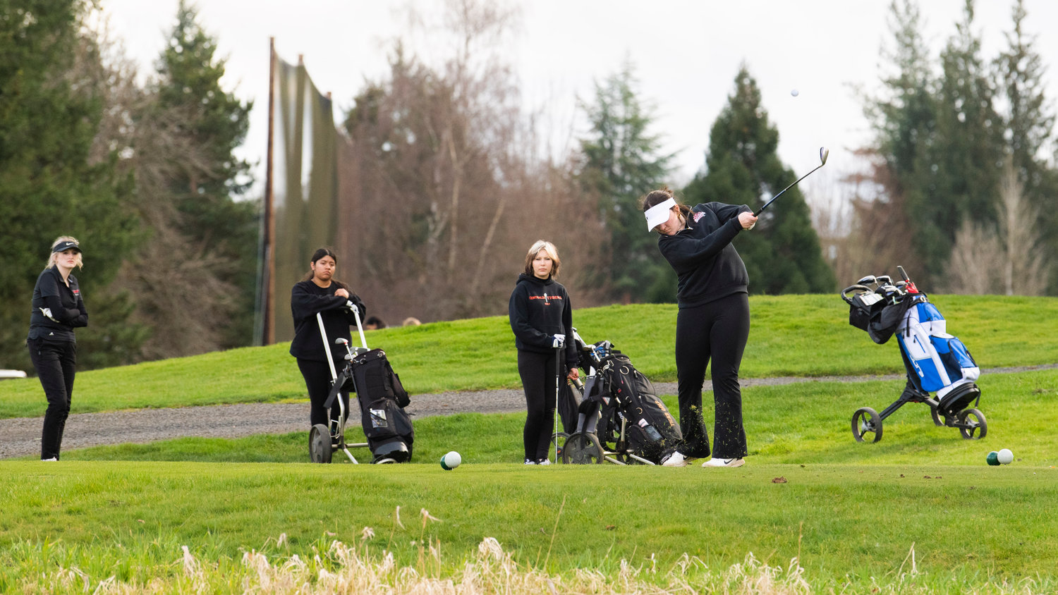 W.F. West sophomore Madyson Alexander tees off at Riverside Golf Course Monday afternoon in Chehalis.