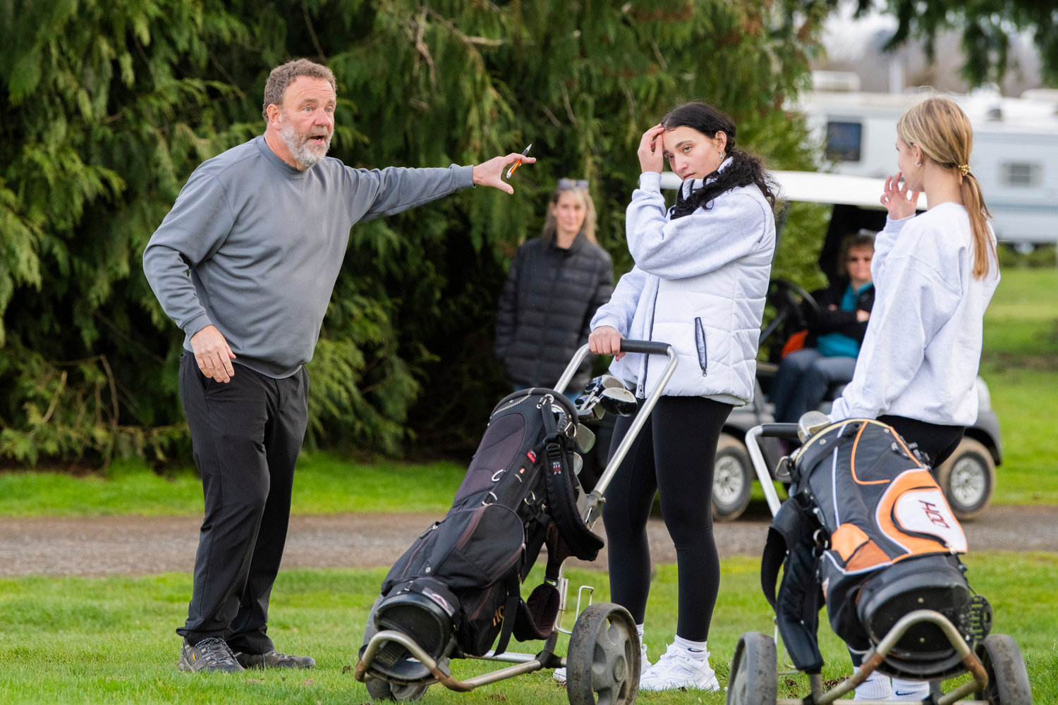 Hal Gronseth talks to athletes at Riverside Golf Course in Chehalis Monday afternoon.