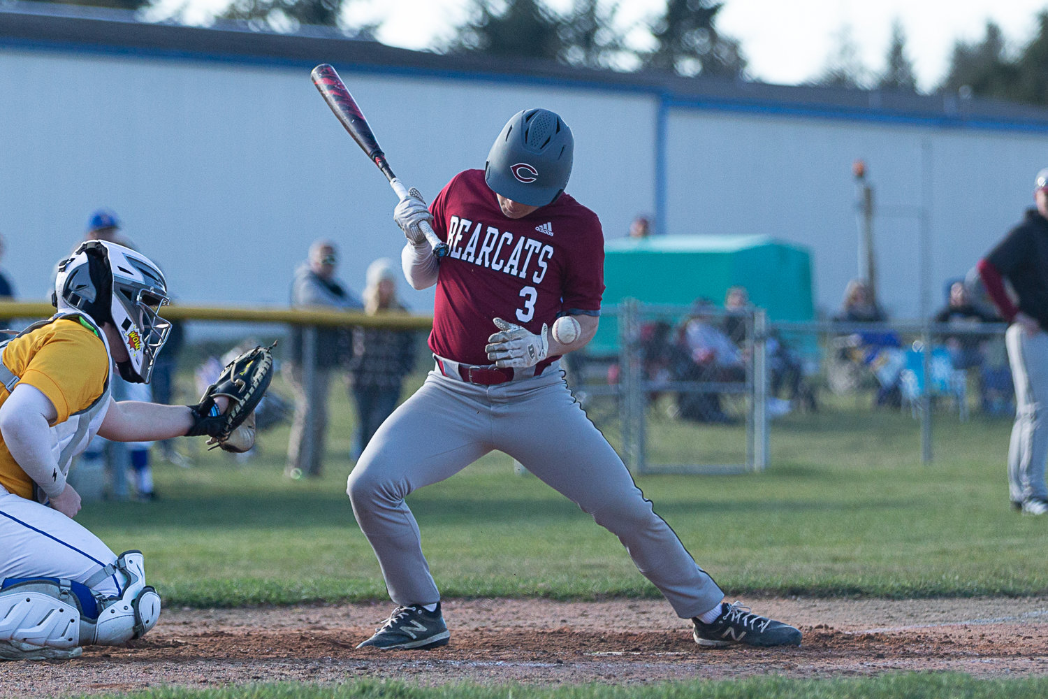 W.F. West third baseman Evan Stajduhar is hit by a pitch against Rochester at Heinz-Rotter Field March 21.