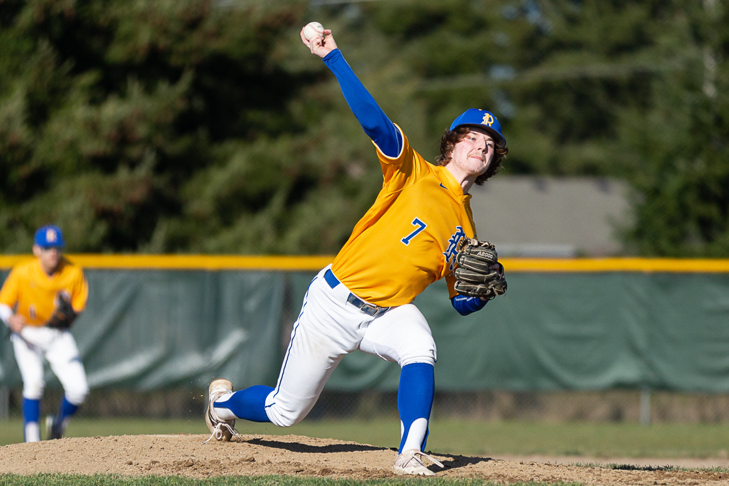 Rochester pitcher Braden Hartley tosses a pitch against W.F. West at Heinz-Rotter Field March 21.