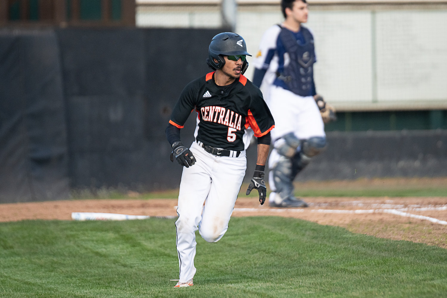 Moshie Eport-Tartios takes a wide turn out of the box on a double in the first inning of Centralia's 14-13 win over Aberdeen on March 21.
