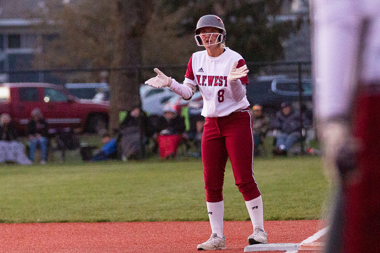 Staysha Fluetsch claps her hands after giving W.F. West the lead in its 3-2 win over Tumwater on March 22.