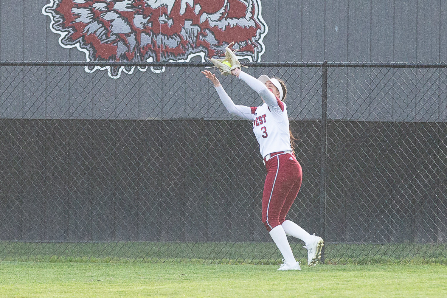 Chase White makes a catch in left field during the first inning of W.F. West's 3-2 win over Tumwater on March 22 at Rec Park.