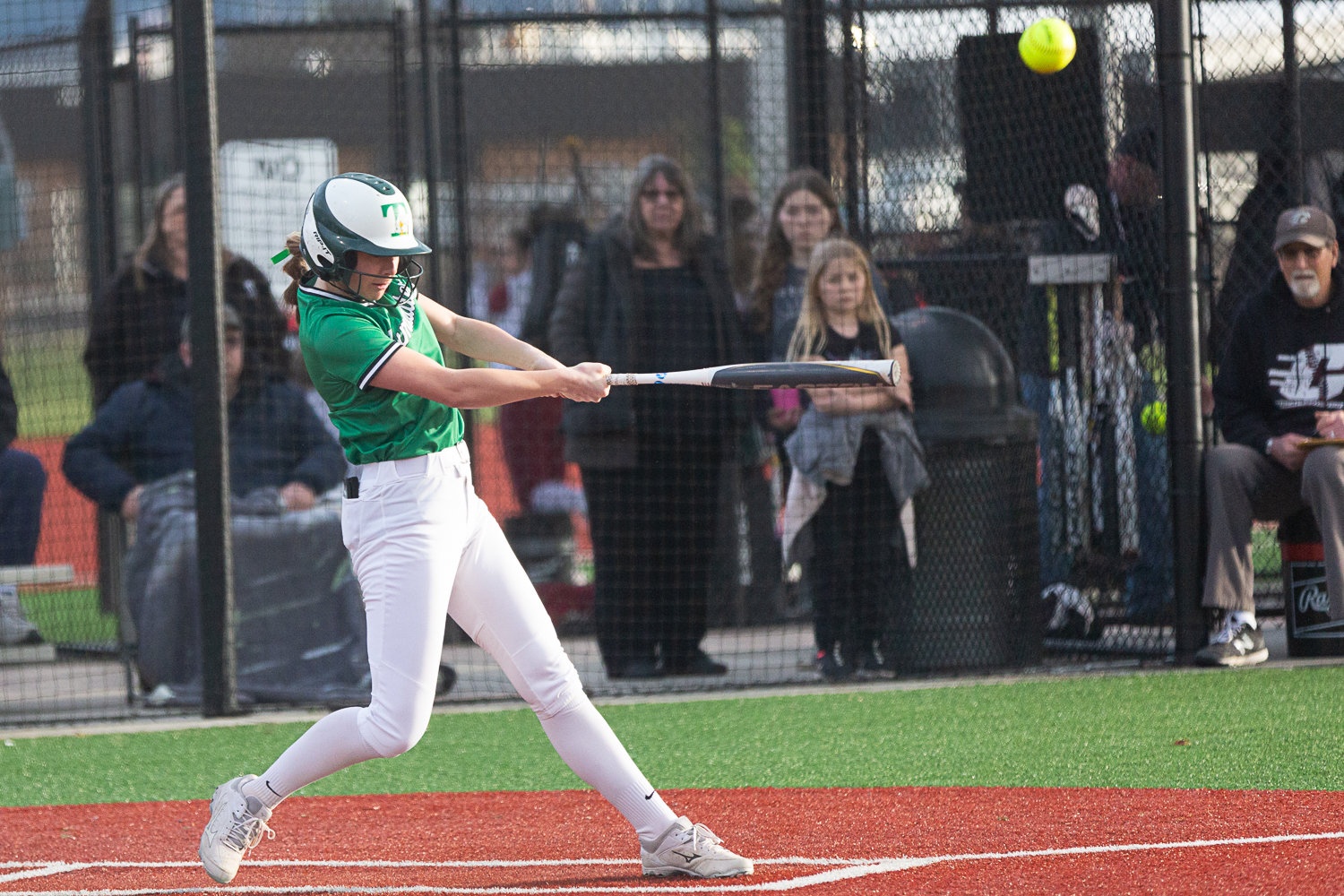 Kylie Waltermeyer loops a triple down the line in the first inning of Tumwater's 3-2 loss to W.F. West at Rec Park on March 22.