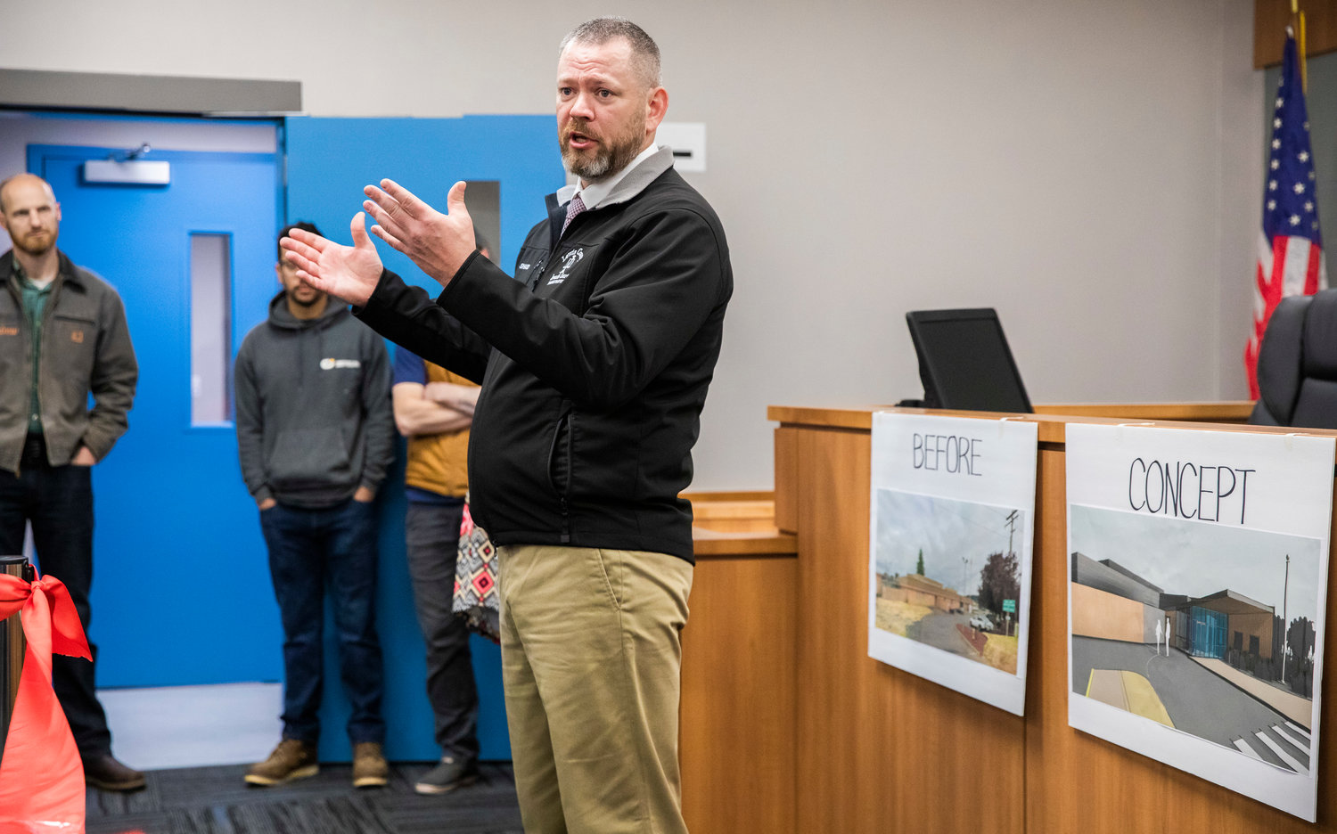 Juvenile Court Administrator Shad Hail talks to attendees during a ribbon cutting ceremony at the Lewis County Juvenile Justice Center in Chehalis Friday morning.