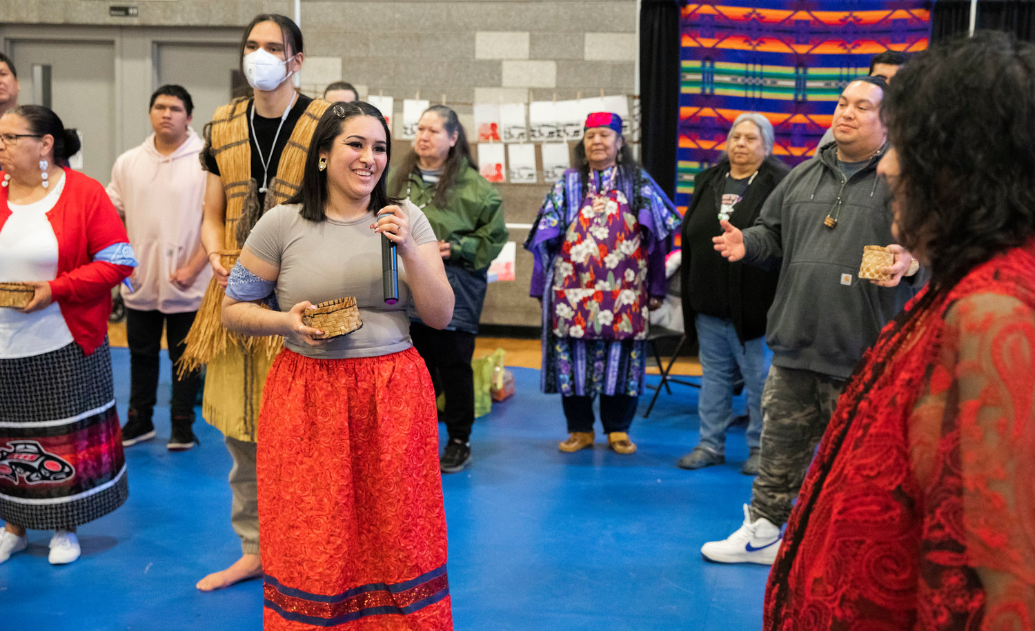 Jeycee Zepeda smiles to Trudy Marcellay during a ceremony honoring the Hazel Pete legacy at the Chehalis Tribe Community Center in Oakville on Saturday.