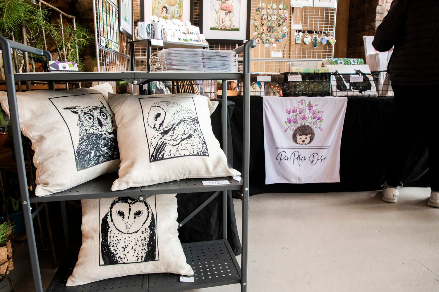 Owl pillows sit on display during the Tenino Arts Spring Market featuring 32 regional artisans inside the Kodiak Room on Sunday.