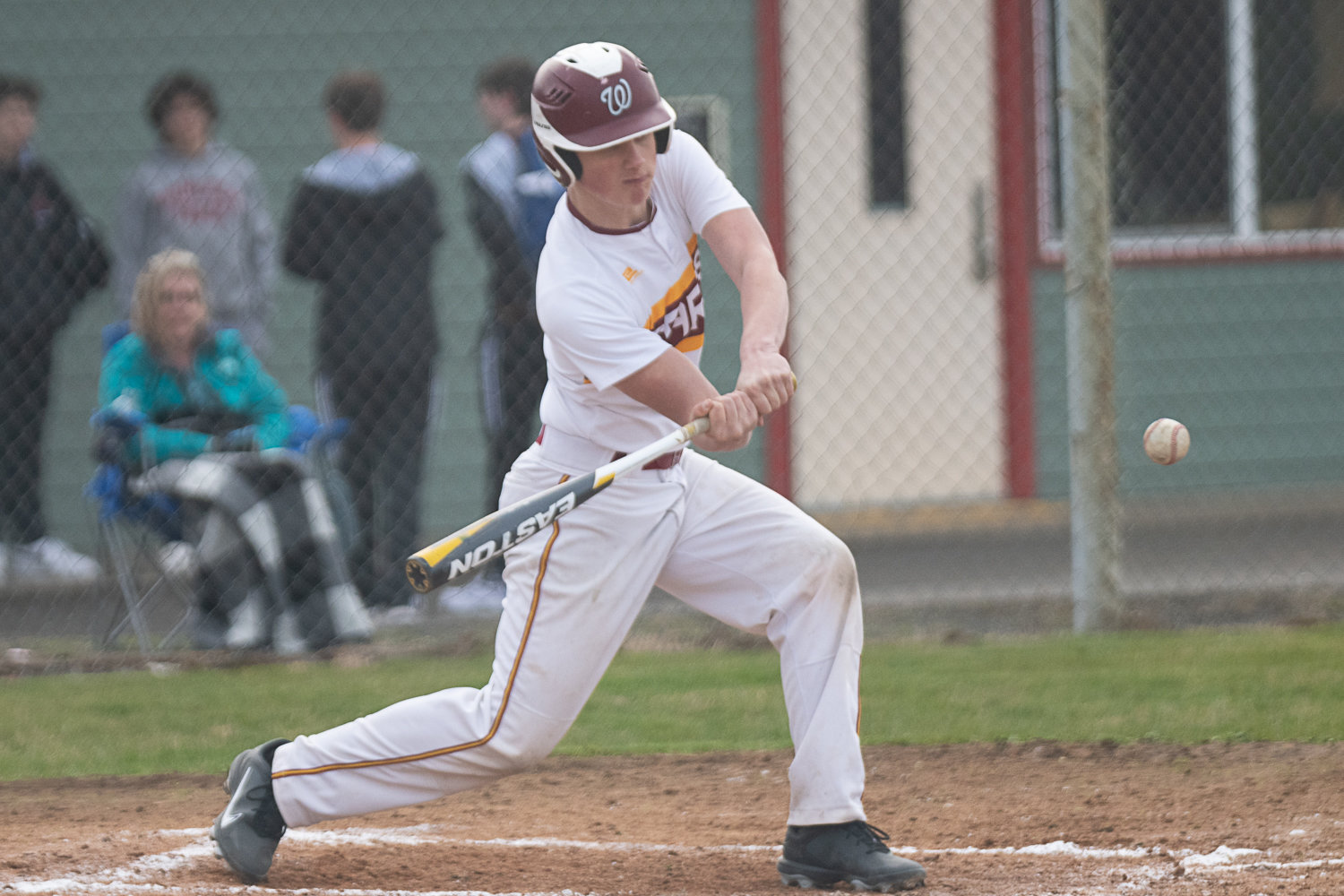 James Cusson gets out in front but manages to lace an RBI single during Winlock's game against MWP on March 27.